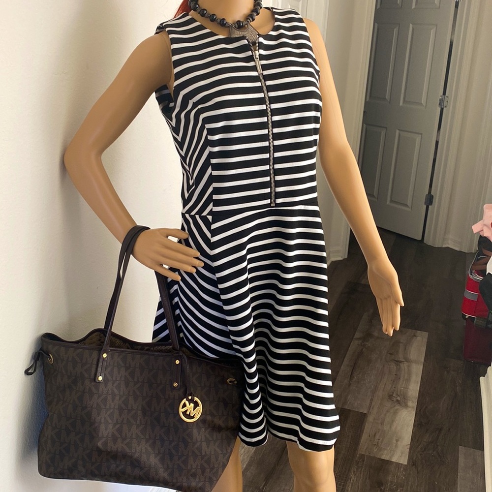 Michal Kor black/white dress size 12.  Reasonable stretch.  Sales are final!